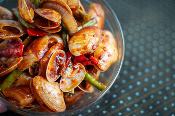 Spicy Paphia textile, or known as retak seribu lala fried with chillies. Served in a bowl. selective focus.