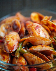 Spicy Paphia textile, or known as retak seribu lala fried with chillies. Served in a bowl. selective focus.