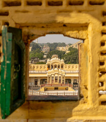 Jaipur, Rajasthan, India; Feb, 2020 : a view of the inner courtyard from a small window at the Hawa...