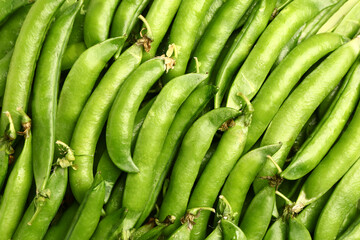 Tasty fresh peas as background