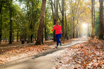 Woman Jogging Outdoors in Park