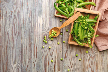 Tasty fresh peas on table