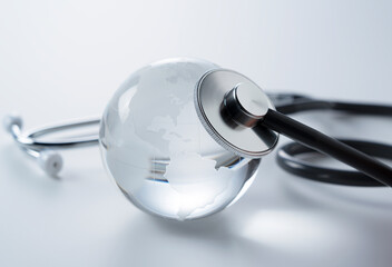 Image of a glass globe and stethoscope