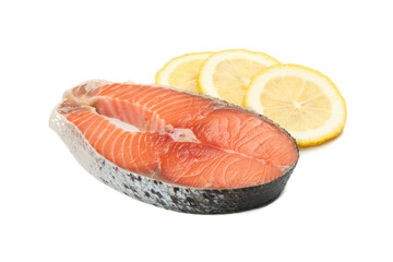 Fresh raw salmon meat and lemon isolated on white background