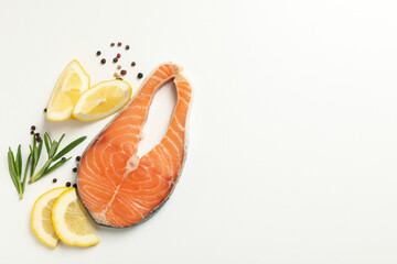Composition with salmon meat and spices on white background, top view