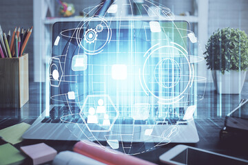 Computer on desktop with social network hologram. Double exposure. Concept of international people connections.