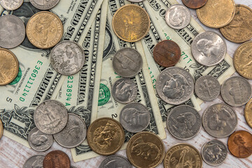 US 1 dollar bills with coin cent on wooden desk. same money conccept.