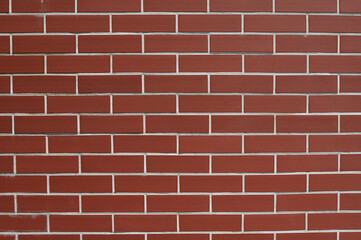 wall of red brick background for writing close-up texts horizontally 