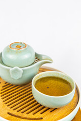 A set of Chinese traditional pottery teapot and cups, serving black tea.