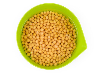 Top view of soaked chickpeas in kitchen bowl before cooking