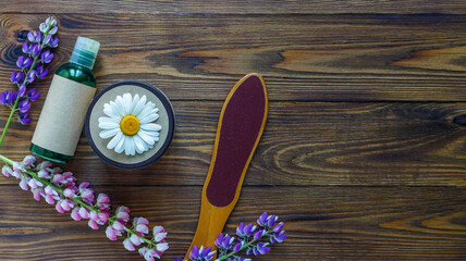 Cosmetic bottle containers with hermal camomile flowers Blank label for mock-up