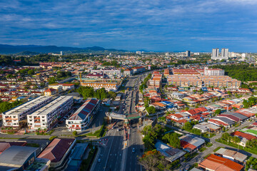 Fototapeta na wymiar Aerial image of car moving on Kota Kinabalu City, Sabah, Malaysia