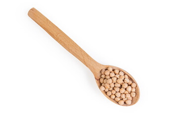 Top view of wooden spoon with uncooked yellow chickpeas