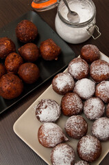 Fat Thursday homemade donuts on a plate, delicious Polish sweet food