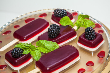 Beautiful pudding with blackberry and mint