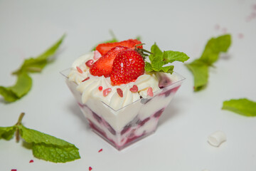 Beautiful dessert with strawberries and mint
