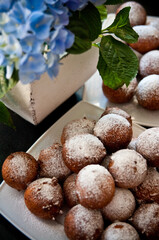 Fat Thursday homemade donuts on a plate, delicious Polish sweet food