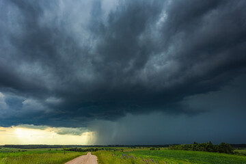 Supercell storm clouds with intense tropic rain