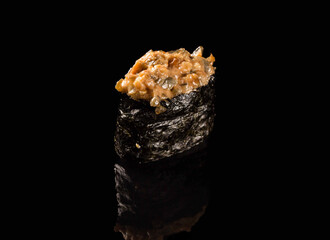 sushi SALMON SPICE on black background.Traditional Asian dish on a black background