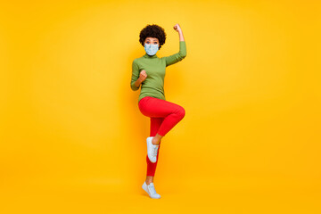 Full length body size view of her she lucky wavy-haired girl celebrating having fun dancing disease mers cov recovery isolated over bright vivid shine vibrant yellow color background