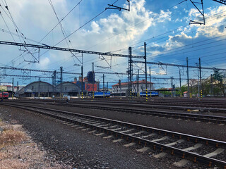Fototapeta na wymiar Multiple train tracks leading to the main station