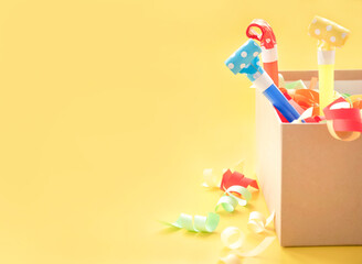 whistles and candy jump out of the box. holiday background.