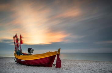 Fototapeta premium Beautiful summer sunset over beach at Baltic sea