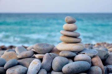 Selbstklebende Fototapeten Zen Zen balanced stones stack on beach  © Dmitry Rukhlenko