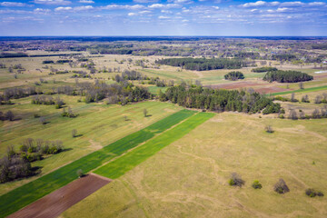 Drone photo of rural landscape with fields and meadows during drought in Mazowsze region of Poland