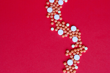 Assorted pharmaceutical medicine pills, tablets and capsules.