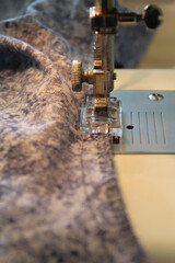 Close ups sewing with machine