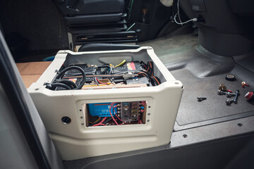 Electronics build into the front seat of a camper van - obrazy, fototapety, plakaty