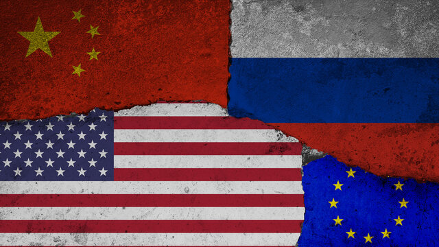Concept of the Great Power Competition with Flags of the United States, Russia, China and the European Union painted on a cracked wall