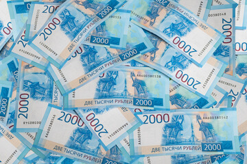 Fototapeta na wymiar Russian money banknotes background texture. Russian ruble money, bills.