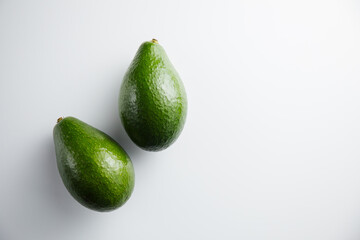 Avocado on a white background. Minimum concept