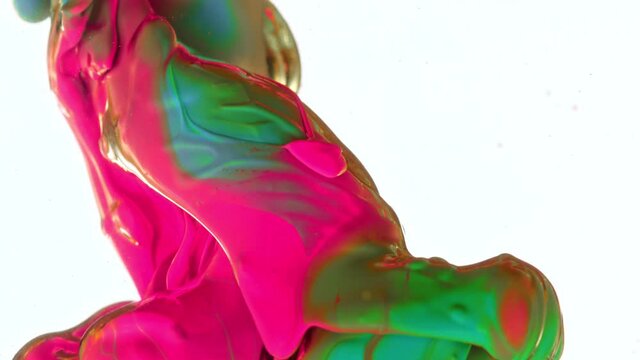 Abstract background, colorful liquid pouring isolated on white background, super slow motion filmed on high speed cinema camera