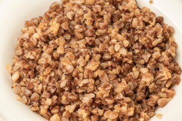 closeup of buckwheat porridge on a plate