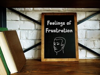 Motivation concept about Feelings of Frustration with inscription on the piece of paper.