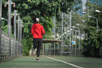 Obraz premium runner on the street be running for exercise on city road; sport, people, exercising and lifestyle concept
