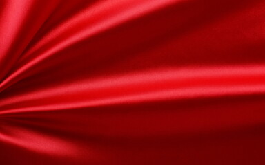 Red silk fabric texture . Beautiful soft crumpled silk xmas, festive  background.Copy space