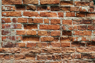 The brick wall of an old building
