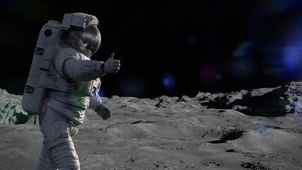 astronaut on the surface of the Moon showing thumbs