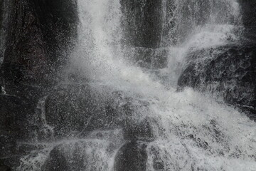 water flowing from the waterfall