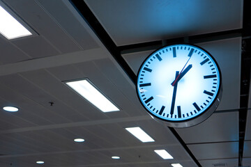 Modern street clock in a public place. Clock at the subway station.