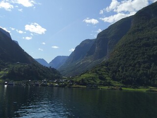 Naklejka na ściany i meble Beautiful Norwegian mountains and cliffs in the Hardangerfjord, Norway. 