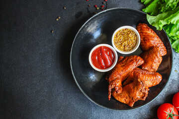 smoked chicken wings meat poultry barbecue grill  fast food
Menu concept. food background top view copy space 
