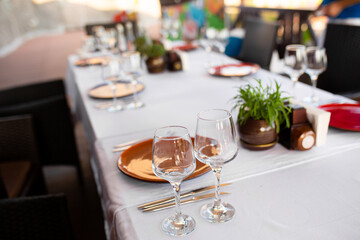 Stylish table setting in an open-air restaurant.
