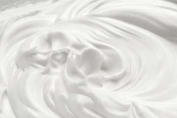 Waves of white eggs cream, dairy yogurt close-up.