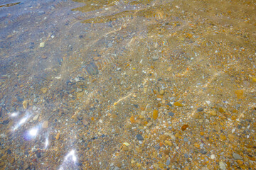 View on the rocks in the crystal clear seas water