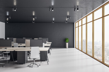 Coworking office interior with equipment and computers